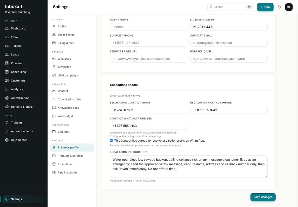 Inboxxit business profile escalation section showing a licence number field, a named escalation contact with phone and WhatsApp number, a consent tick confirming the contact agreed to receive alerts, and written escalation instructions for water near electrics and sewage backups