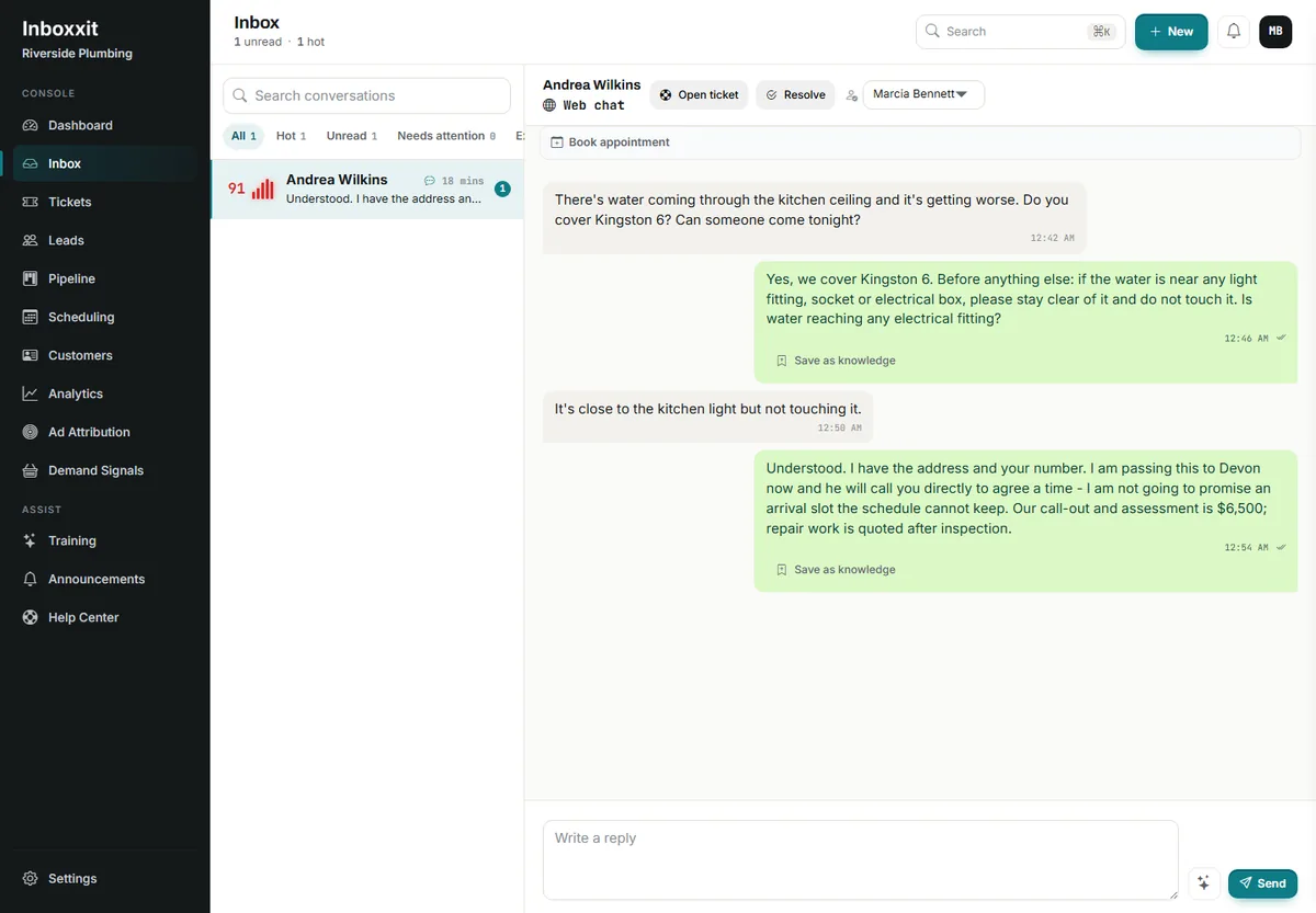 Inboxxit shared inbox showing a plumbing conversation in which the assistant confirms the service area, gives a fixed safety instruction about water near electrical fittings, captures the address, hands the job to a named colleague and separates the call-out fee from the repair price